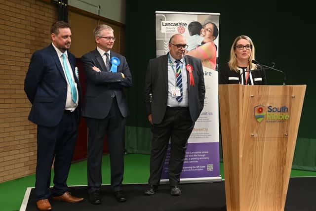 Conservative Michael Green (second left) learning that he had been defeated by Reform UK's Andy Blake (left)