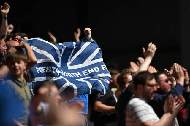 Preston North End fans celebrate in the stands ar Ashton Gate