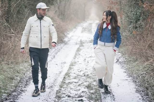 The first image used by Michelle Keegan to say goodbye to Brassic depicts her character Erin walking alongside Joe Gilgun's character Vinnie.