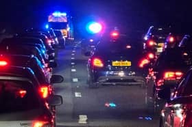 Traffic was held on the M55 between J7 for Accrington and J8 for Huncoat while police rescued a woman on a motorway bridge