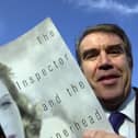 Headteacher of Ribbleton Hall High School in Ribbleton, Preston, Nigel Jepson, with his book "The Inspector and the Superhead" which has been published