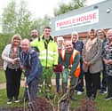 From left to right: Deirdre Mitten, Centre Manage at Twinkle House; Ben Pendleton, Contracts Instructor at Midstream Garden Centre; John Duxbury, Facilities officer at Twinkle House; Matthew, Twinkle House client; Vera Vaughn, Twinkle House Volunteer; Daniel, Twinkle House Client; Kath Jones, Essity Skelmersdale site; Debrah Hughes, Finance Officer at Twinkle House; Amanda Rose, Essity Skelmersdale site; and Tina Duffy, Sleep Therapist Twinkle House.