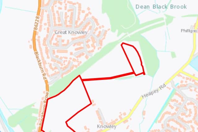 The red area marks where the houses would be built.