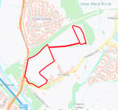 The red area marks where the houses would be built.