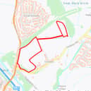 The red area marks where the houses would be built.