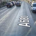 Traffic delays and tailbacks are likely after the crash on Manchester Road, just after Oak Hill Park.