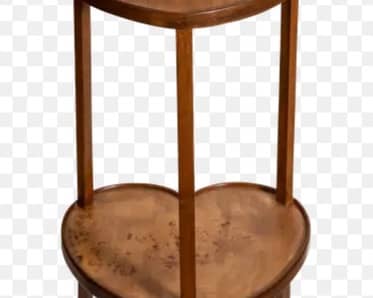 The image below shows a similar table but the one that was stolen has a round bottom tier with a small hole in the middle.