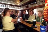 Margaret Taylor and regulars at the Selbourne pub, Frenchwood, Preston