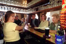 Margaret Taylor and regulars at the Selbourne pub, Frenchwood, Preston