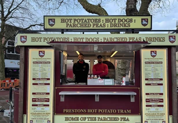 The Spud Bros at work in the traditional hot potato tram which will be closed this week while they treat their hard-working staff to a trip to Ibiza. 