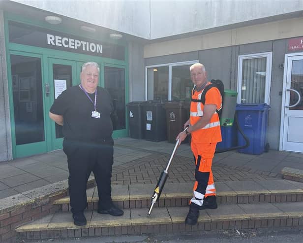 Image: Councillor Stewart Eaves, Portfolio Holder for Environmental Services and Council Waste Services Operative with “Gum Buster” at Willows Lane Depot, Accrington