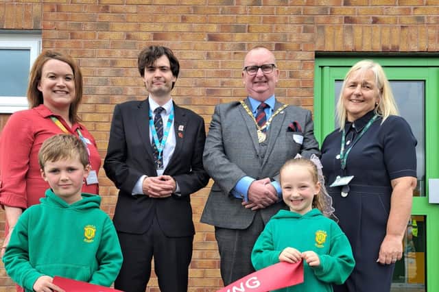 Pictured on the back row from left to right in front of the plaque at the official opening of the new facilities at Lea Community Primary School are Sophie Inman, school business manager, County Councillor Matthew Salter, cabinet member for Education and Skills, County Councillor and LCC chairman Alf Clempson, headteacher Lynne Slater, and on the front row from left to right are reception pupils Stanley and Cara.