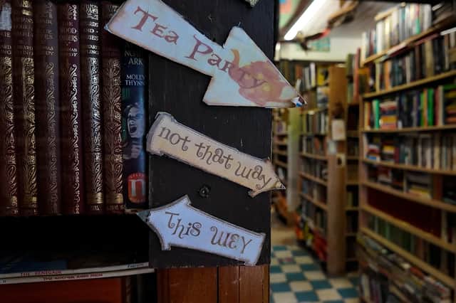 Signs and books inside the Old Pier Bookshop. Photo by Lucinda Herbert