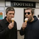 Noel and Liam Gallagher of Oasis fame enjoy an ice-cream outside Tootsies Ice Cream Parlour & Coffee Shop.