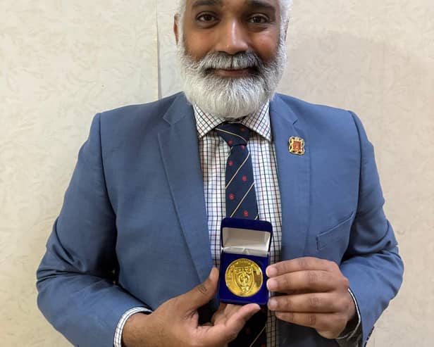 Dr Sakthi Karunanithi with his medal