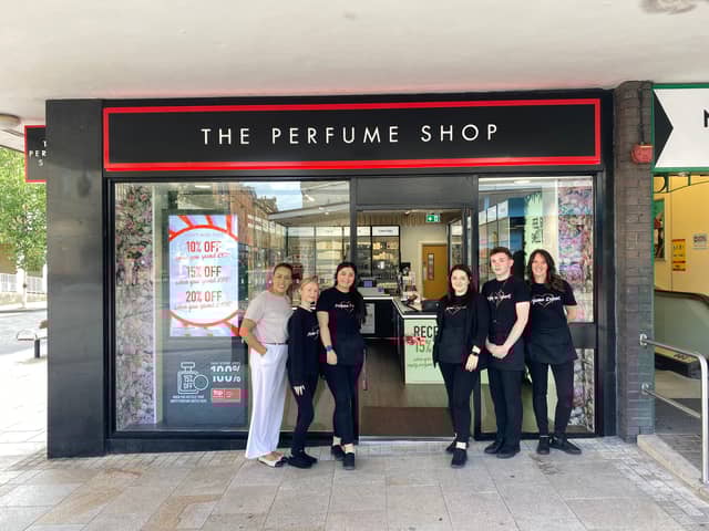 Staff at the newly revamped The Pefume Shop in Burnely on opening day.