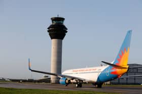 Manchester Airport ATC tower with Jet2 aircraft