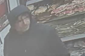 Officers want to speak to this man following a street attack in Preston