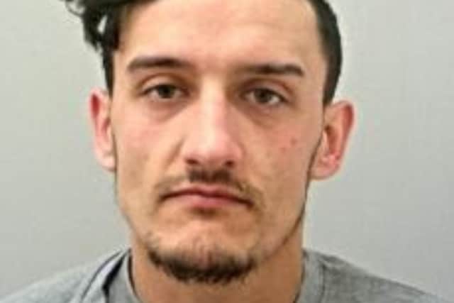 Police are still looking for Imran Hussain, 32, in connection with a stabbing outside a mosque in Accrington