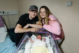 Mike Evans and Chloe Lofthouse with baby Luca who was born unexpectedly on August 8