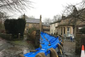 Pictured are flood defences off Greenside in Ribchester,  installed by the Environment Agency in 2021.