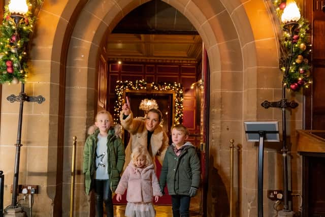 Families are welcomed into Warwick Castle for a Christmas experience filled with festive decorations, lights and surprises around every corner