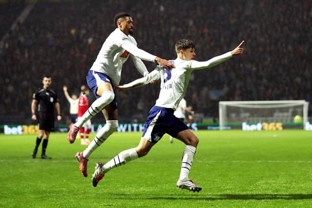 Harrison Armstrong of celebrates scoring a Preston goal with teammate Daniel Jebbison.