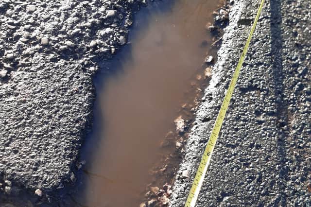 3ft long and 3 inch-deep pot hole
