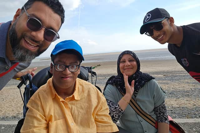 Muhammed (centre) pictured with his family