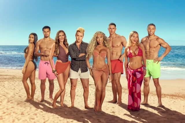 The full line up for Celebrity Ex on the Beach, featuring Helen Flanagan in the bright pink bikini and Amy Kenyon in the brown bathing suit.