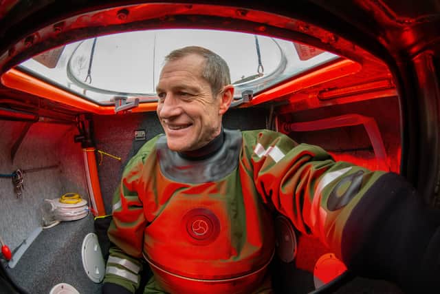 Andrew Bedwell inside his tiny vessel, which he says fits him “perfectly”.