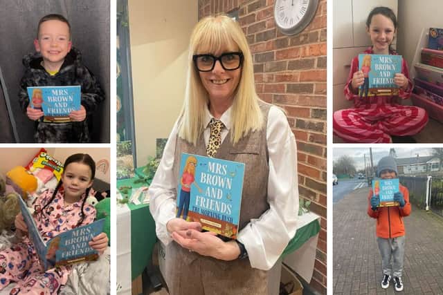 Mary Brown and various Preston school pupils with her first book ‘Mrs Brown and Friends The Morning Rush'.