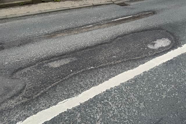 Lancashire County Council says it has a method of prioritising potholes for repair, like these on the A674