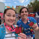 Kat (left) and Helen celebrate completing the Manchester Marathon
