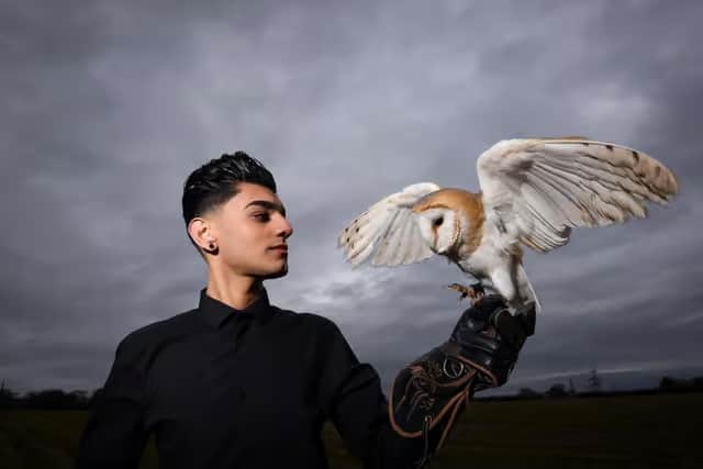 The late Bailey Lister with rescue owl Twilight.