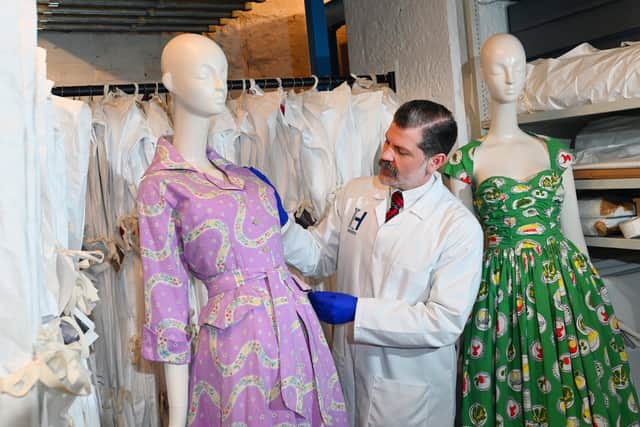 Scott measures up one of the iconic dresses
