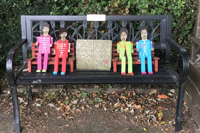 The Beatles remembered on an unusual memorial bench at Our Lady and St Michael’s churchyard on Alston Lane