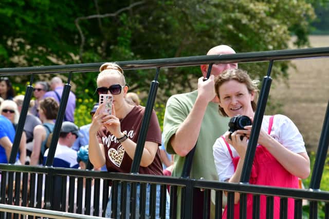 Hundreds sought out the best viewpoint and lined the banks of Avenham Park to witness the reopening of Preston’s Tram Bridge