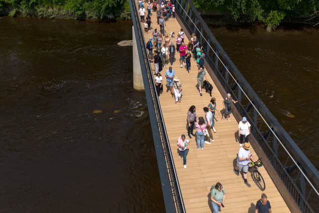 Drone views of the first people to cross the new Tram Bridge in Avenham Park in Preston. Photo: Kelvin Lister-Stuttard