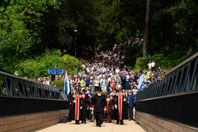 Preston's Town Crier leads the way across the new bridge
