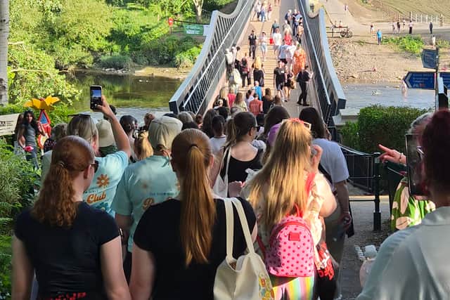 Walking and running clubs from across Lancashire came together at Avenham Park, Preston, on the to throw their backing behind the Lancashire Police and Crime Commissioner's #GetTheMessage campaign against violence against women and girls. Pictured on the new Tram Bridge