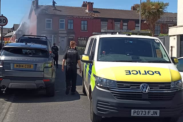 The scene in Bolton Road, Chorley, during the man's tense standoff with police on Sunday (May 24)