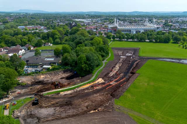 Silt from the lake is being shifted to the football pitches to help improve them