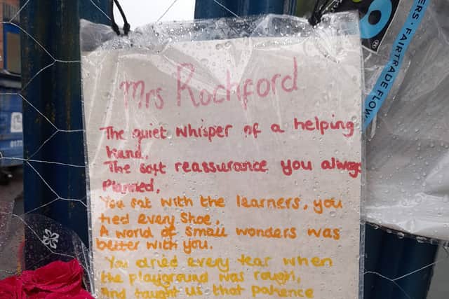 Among the wall of flowers, St Joseph's pupils have shared a heart-warming poem in honour of Mrs Rochford