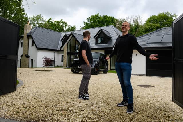 Dawid Szluc from Crewe takes a look around the Penwortham House that he has won.