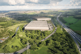 A computer-generated images showing the proposed warehouses sitting alongside the M65