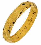 The gold memorial ring inscribed to Dr Richard Busby, which was found by metal detectorist Amanda Parker in Catforth, near Preston, and is expected to fetch around £3,000 at auction