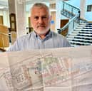 Objector Chris Rimmer, of Galgate, with plans showing proposed altered land levels for new homes on fields at Highland Brow