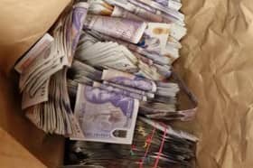 Police said approximately £30,000 to £40,000 in cash was found after officers stopped a car on the M6 near Preston 