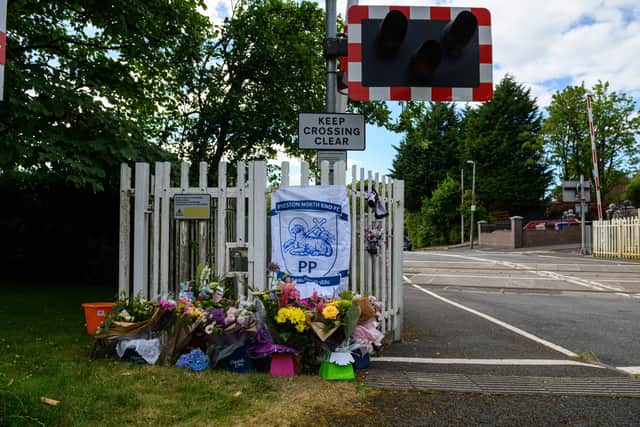 Flowers left at the scene of Thursday's tragic accident on Station Road in Hoghton